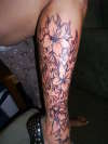 flowers with flames tattoo