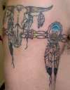 cattleskull arm band tattoo