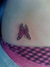 pink butterfly tattoo