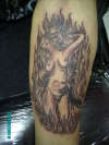 reaper holdin a chick tattoo