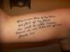 Arm quote tattoo