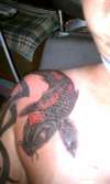 black & red koi tattoo