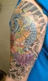 Koi fish Half sleeve tattoo