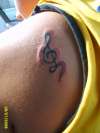 Music note and heart tattoo