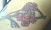 cherry blossom w lettering tattoo