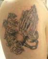 skeleton praying hands w cuffs n lettering tattoo