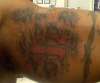 superman w skin rip tattoo