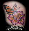 Iris flower, Monarch butterfly tattoo