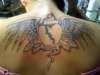 Meghans wings tattoo