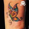 borboleta + ''G'' tattoo