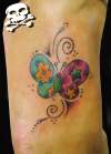 borboleta colorida tattoo