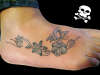 borboleta com ramos sombreada tattoo