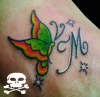 borboleta mais ''M'' tattoo