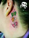 borboletas atras da orelha tattoo