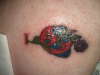 bree make love not war tattoo