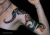 color abstract arm tattoo