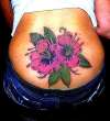lower back lilys tattoo