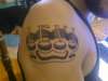 Brass knuckle Levi tattoo