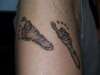 Indys Feet (5 weeks old) tattoo