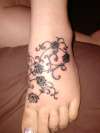 black rose design tattoo