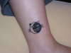 Cat Face Sun Moon tattoo