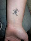 Chinese Symble for love (left wrist) tattoo