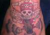 Sailor Jerry skeleton on motorcycle, Tricks Tattoo