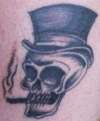Skull smoking tattoo