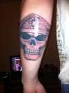 Skull with beret tattoo