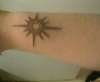 Sunburst tattoo
