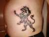 tribal lion rampant tattoo