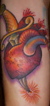 Heart and dagger tattoo