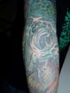 sunken ship vortex elbow tattoo