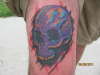 purple skull tattoo