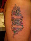 skulls and banner tattoo