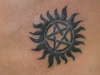 star sun tattoo