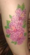 thigh ink tattoo