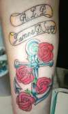 Anchor and Banner with roses tattoo