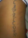 Capricorn on side tattoo