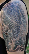 black gray koi maple leaf tattoo