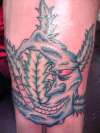 Moon and pot leaf tattoo
