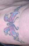 butterfly on foot tattoo