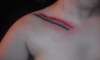 rainbow covering a scar tattoo