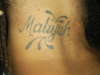 Daughter's Name on Neck tattoo