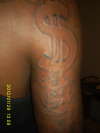 Melting Money tattoo