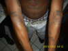 Money Bags on Arms tattoo
