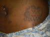 Name on Stomach tattoo