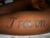 Name on inside of arm tattoo