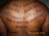 Scripture on Back tattoo