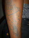 Skeletons on the block w/ flame background tattoo